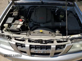 2004 Isuzu Rodeo z VIN 4S2DM58Y144302204, wystawiony jako Copart lot #59227675 z przebiegiem 98 998 mil mil oraz Czysty tytuł • Clean title. Historia ofert i sprzedaży dostępna na DreamBid. Obrazek 12.