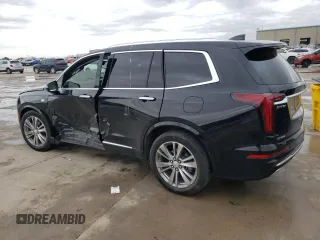 2023 Cadillac XT6 FWD Premium Luxury z VIN 1GYKPCRS5PZ101867, wystawiony jako Copart lot #51773545 z przebiegiem 31 322 mil mil oraz Szkoda całkowita • Salvage title. Historia ofert i sprzedaży dostępna na DreamBid. Obrazek 2.