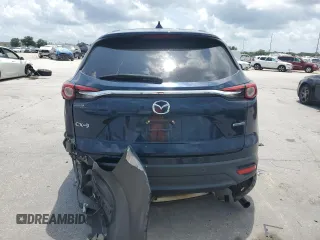 2020 Mazda CX-9 Touring with VIN JM3TCACY1L0423340, listed as a Copart auction lot 57389305 with 64,737 mi miles and Salvage title. Bid and sale history available at DreamBid. Image 6.