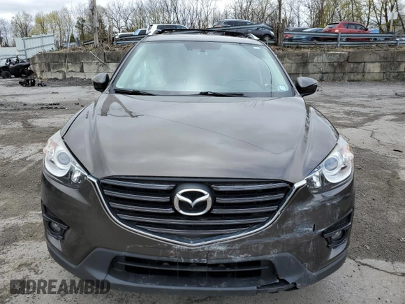 2016 Mazda CX-5 Grand Touring with VIN JM3KE4DY5G0848717, listed as a Copart auction lot 53249895 with 86,746 mi miles and Salvage Title. Bid and sale history available at carsss.com. Image 5.