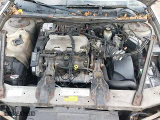 1999 Chevrolet Lumina with VIN 2G1WL52M0X9134529, listed as a IAAI auction lot 41565162 with 127,944 mi miles. Bid and sale history available at carsss.com. Image 10.