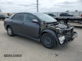 2010 Toyota Corolla with VIN 1NXBU4EE0AZ209169, listed as a Copart auction lot 53502225 with 214,412 mi miles and Salvage title. Bid and sale history available at DreamBid. Image 4.