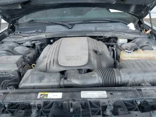 2013 Dodge Challenger R/T with VIN 2C3CDYBT2DH535991, listed as a IAAI auction lot 41446711 with 154,731 mi miles. Bid and sale history available at carsss.com. Image 10.