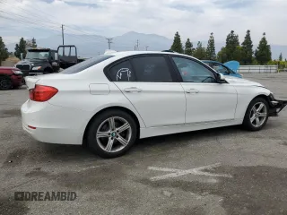 2014 BMW 3 Series 320i with VIN WBA3B1G53ENS80793, listed as a Copart auction lot 53149125 with 98,531 mi miles and Salvage Title. Bid and sale history available at carsss.com. Image 3.