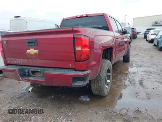 2018 Chevrolet Silverado 1500 LT with VIN 3GCUKREC5JG387905, listed as a IAAI auction lot 41392528 with 96,087 mi miles. Bid and sale history available at carsss.com. Image 4.