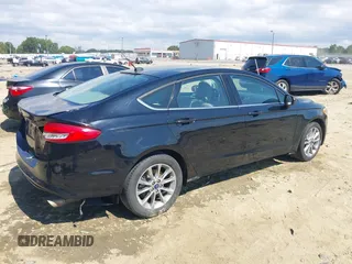 2017 Ford Fusion SE with VIN 3FA6P0H75HR391848, listed as a IAAI auction lot 40239061 with 173,515 mi miles. Bid and sale history available at carsss.com. Image 4.