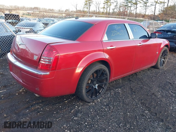 2007 Chrysler 300 C with VIN 2C3KA63H87H697826, listed as a IAAI auction lot 41819347 with 999,999 mi miles. Bid and sale history available at carsss.com. Image 4.