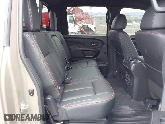 2024 Nissan Titan Pro-4X z VIN 1N6AA1ED0RN114614, wystawiony jako IAAI lot #41548196 z przebiegiem 3 405 mil mil oraz . Historia ofert i sprzedaży dostępna na DreamBid. Obrazek 8.