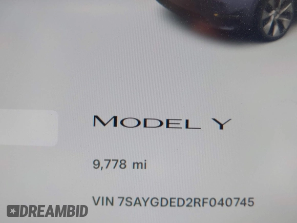 2024 Tesla Model Y with VIN 7SAYGDED2RF040745, listed as a IAAI auction lot 41986613 with 9,778 mi miles and . Bid and sale history available at DreamBid. Image 15.