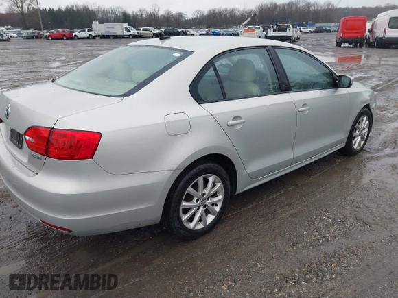 2011 Volkswagen Jetta SE with VIN 3VWDZ7AJ4BM387236, listed as a IAAI auction lot 41875995 with 202,028 mi miles and . Bid and sale history available at DreamBid. Image 4.
