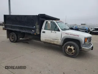 2001 GMC Sierra 1500 with VIN 3GDKC34GX1M100674, listed as a Copart auction lot 43498685 with 140,259 mi miles and Salvage Title. Bid and sale history available at DreamBid. Image 4.