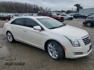 2014 Cadillac XTS Premium z VIN 2G61P5S39E9321491, wystawiony jako Copart lot #48762365 z przebiegiem 117 681 mil mil oraz Szkoda całkowita • Salvage title. Historia ofert i sprzedaży dostępna na DreamBid. Obrazek 4.