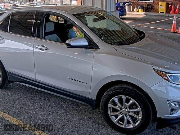 2020 Chevrolet Equinox LT z VIN 2GNAXJEV5L6230548, wystawiony jako IAAI lot #42573168 z przebiegiem 95 519 mil mil oraz . Historia ofert i sprzedaży dostępna na DreamBid. Obrazek 24.