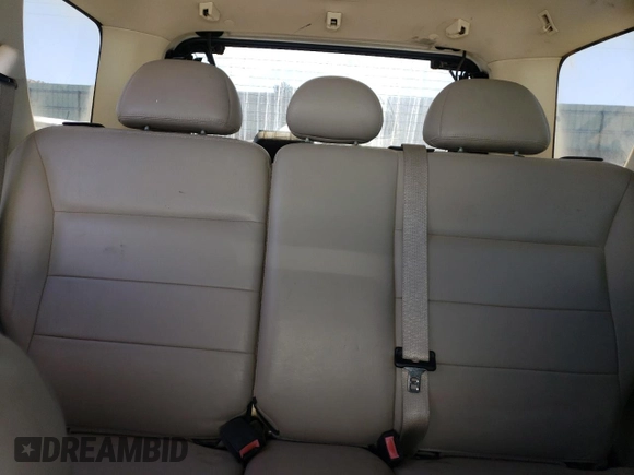 2008 Ford Escape XLT с VIN 1FMCU03128KC70462, выставлен на аукционе Copart как лот 57118055 с пробегом 215 790 миль миль и Списание • Salvage title. История ставок и продаж доступна на DreamBid. Изображение 10.