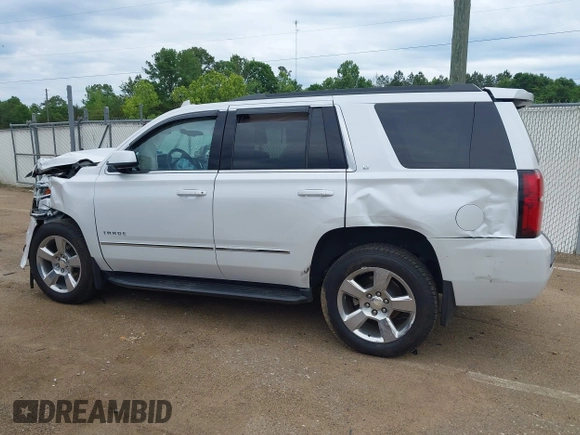 2020 Chevrolet Tahoe LT with VIN 1GNSCBKC4LR181887, listed as a IAAI auction lot 42160821 with 106,757 mi miles and . Bid and sale history available at DreamBid. Image 14.