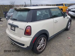 2007 MINI Hardtop S with VIN WMWMF73527TL89861, listed as a IAAI auction lot 41953013 with 111,222 mi miles and . Bid and sale history available at DreamBid. Image 4.