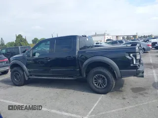 2020 Ford F-150 Raptor with VIN 1FTFW1RG2LFA30858, listed as a IAAI auction lot 42192391 with 90,018 mi miles and . Bid and sale history available at carsss.com. Image 14.