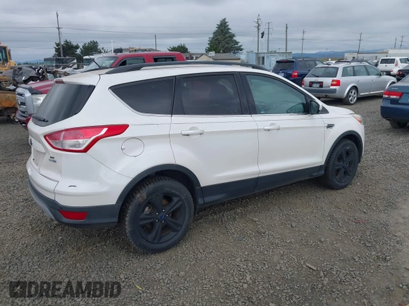 2014 Ford Escape SE with VIN 1FMCU9GX4EUB09341, listed as a IAAI auction lot 42398890 with 117,541 mi miles and . Bid and sale history available at DreamBid. Image 4.