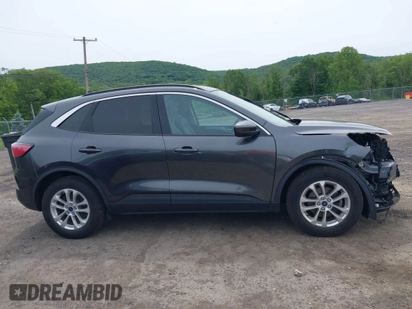 2020 Ford Escape SE z VIN 1FMCU9G68LUB54383, wystawiony jako IAAI lot #42356897 z przebiegiem 69 587 mil mil oraz . Historia ofert i sprzedaży dostępna na DreamBid. Obrazek 14.