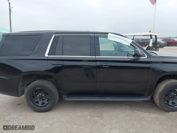 2019 Chevrolet Tahoe Commercial with VIN 1GNLCDECXKR231072, listed as a IAAI auction lot 41800007 with 100,101 mi miles. Bid and sale history available at carsss.com. Image 13.