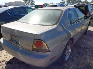 1994 Honda Accord EX w/Leather with VIN 1HGCD5652RA118870, listed as a IAAI auction lot 41606048 with 278,958 mi miles. Bid and sale history available at carsss.com. Image 4.