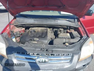 2007 Kia Sportage LX with VIN KNDJF724977426704, listed as a IAAI auction lot 41769772 with 288,082 mi miles and . Bid and sale history available at carsss.com. Image 10.