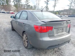 2010 Kia Forte SX with VIN KNAFW4A36A5249266, listed as a IAAI auction lot 41743559 with 215,108 mi miles. Bid and sale history available at carsss.com. Image 3.