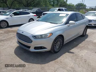 2014 Ford Fusion Titanium with VIN 3FA6P0K99ER358244, listed as a IAAI auction lot 42085703 with 194,626 mi miles. Bid and sale history available at carsss.com. Image 2.