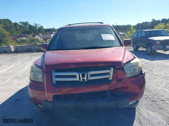 2006 Honda Pilot EX-L with VIN 5FNYF18566B022909, listed as a IAAI auction lot 40576412 with 310,278 mi miles. Bid and sale history available at carsss.com. Image 12.