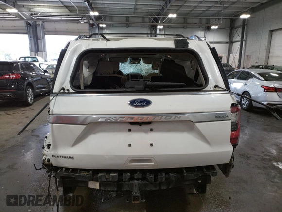 2021 Ford Expedition Max Platinum with VIN 1FMJK1MT0MEA33934, listed as a Copart auction lot 60350603 with 70,327 mi miles and . Bid and sale history available at DreamBid. Image 6.