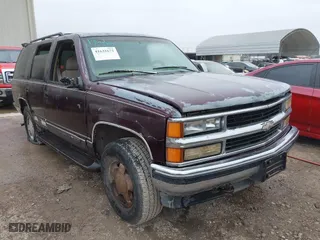 1997 Chevrolet Tahoe with VIN 1GNEK13R8VJ329165, listed as a IAAI auction lot 41631672 with 166,976 mi miles. Bid and sale history available at carsss.com. Image 1.