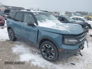 2021 Ford Bronco Sport Outer Banks z VIN 3FMCR9C69MRA31952, wystawiony jako IAAI lot #41295719 z przebiegiem 60 818 mil mil oraz . Historia ofert i sprzedaży dostępna na DreamBid. Obrazek 1.