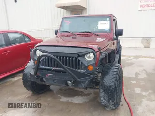 2007 Jeep Wrangler Unlimited Sahara with VIN 1J4GB59197L142223, listed as a IAAI auction lot 42025639 with 155,274 mi miles and . Bid and sale history available at DreamBid. Image 12.