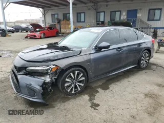 2023 Honda Civic EX z VIN 2HGFE1F72PH312995, wystawiony jako Copart lot #57284305 z przebiegiem 7 921 mil mil oraz Szkoda całkowita • Salvage title. Historia ofert i sprzedaży dostępna na DreamBid. Obrazek 1.