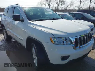 2012 Jeep Grand Cherokee Laredo with VIN 1C4RJFAG6CC279427, listed as a IAAI auction lot 41956034 with 86,689 mi miles. Bid and sale history available at carsss.com. Image 1.