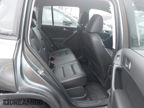 2017 Volkswagen Tiguan S with VIN WVGBV7AX5HK028788, listed as a IAAI auction lot 41699615 with 113,608 mi miles and . Bid and sale history available at DreamBid. Image 8.