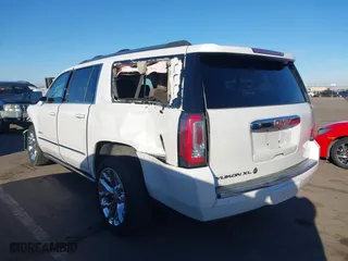 2018 GMC Yukon XL Denali with VIN 1GKS2HKJ2JR183877, listed as a IAAI auction lot 41652039 with 123,075 mi miles. Bid and sale history available at carsss.com. Image 3.