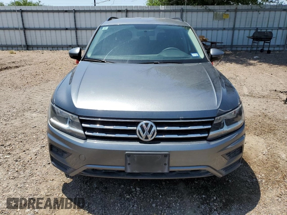 2018 Volkswagen Tiguan S z VIN 3VV1B7AXXJM109293, wystawiony jako Copart lot #55802845 z przebiegiem 49 821 mil mil oraz Szkoda całkowita • Salvage title. Historia ofert i sprzedaży dostępna na DreamBid. Obrazek 5.