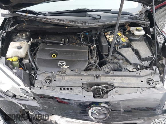 2012 Mazda 5 Grand Touring with VIN JM1CW2DL9C0112005, listed as a IAAI auction lot 42680646 with 140,724 mi miles and . Bid and sale history available at DreamBid. Image 10.