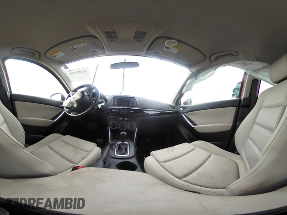 2014 Mazda CX-5 Touring with VIN JM3KE2CY4E0411780, listed as a IAAI auction lot 41903570 with 103,658 mi miles and . Bid and sale history available at DreamBid. Image 18.