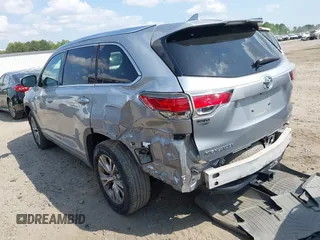2014 Toyota Highlander XLE z VIN 5TDKKRFH1ES036742, wystawiony jako IAAI lot #42167218 z przebiegiem 165 837 mil mil oraz . Historia ofert i sprzedaży dostępna na DreamBid. Obrazek 3.