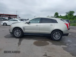 2015 Cadillac SRX Performance Collection with VIN 3GYFNCE34FS639168, listed as a IAAI auction lot 42191995 with 101,358 mi miles and . Bid and sale history available at DreamBid. Image 14.