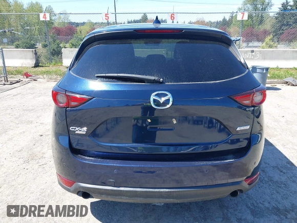 2019 Mazda CX-5 Signature with VIN JM3KFBEY7K0589236, listed as a IAAI auction lot 42078418 with 86,959 mi miles. Bid and sale history available at carsss.com. Image 16.