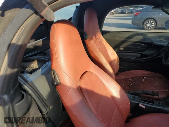 1998 Porsche Boxster с VIN WP0CA2987WS620369, выставлен на аукционе Copart как лот 81003964 с пробегом Не указан миль и Списание • Salvage title. История ставок и продаж доступна на DreamBid. Изображение 10.