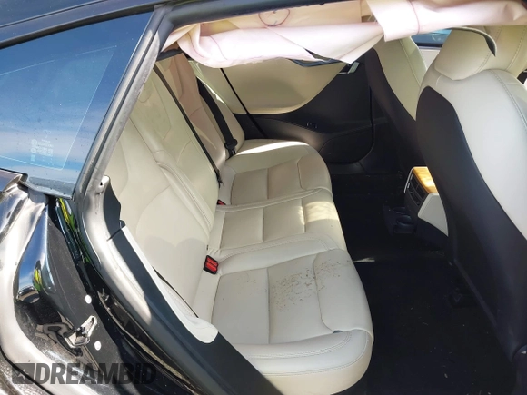 2021 Tesla Model S Long Range Plus z VIN 5YJSA1E24MF426299, wystawiony jako IAAI lot #41673498 z przebiegiem 102 035 mil mil oraz . Historia ofert i sprzedaży dostępna na DreamBid. Obrazek 8.