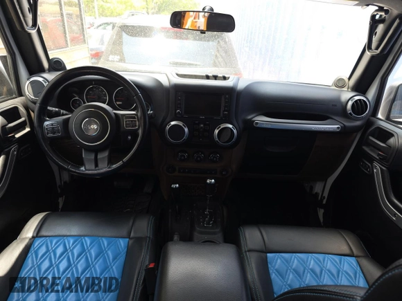 2012 Jeep Wrangler Unlimited Altitude z VIN 1C4HJWEG5CL222948, wystawiony jako Copart lot #61101825 z przebiegiem 106 991 mil mil oraz Czysty tytuł • Clean title. Historia ofert i sprzedaży dostępna na DreamBid. Obrazek 9.