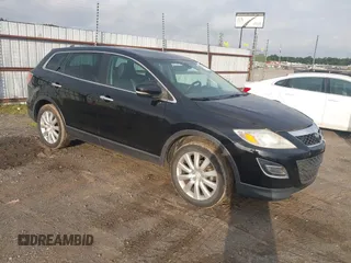 2010 Mazda CX-9 Sport z VIN JM3TB2MA5A0205294, wystawiony jako IAAI lot #42258059 z przebiegiem 238 455 mil mil oraz . Historia ofert i sprzedaży dostępna na DreamBid. Obrazek 1.