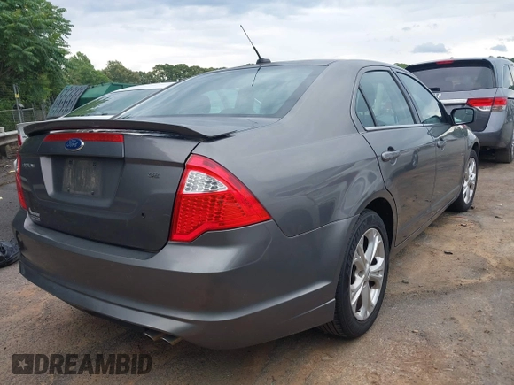 2012 Ford Fusion SE z VIN 3FAHP0HA0CR134819, wystawiony jako IAAI lot #42376667 z przebiegiem 147 014 mil mil oraz . Historia ofert i sprzedaży dostępna na DreamBid. Obrazek 4.