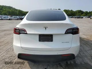 2022 Tesla Model Y Long Range z VIN 7SAYGDEE5NF355624, wystawiony jako Copart lot #58058465 z przebiegiem 33 784 mil mil oraz Szkoda całkowita • Salvage title. Historia ofert i sprzedaży dostępna na DreamBid. Obrazek 6.