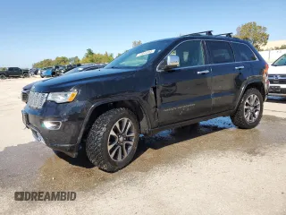 2017 Jeep Grand Cherokee Overland with VIN 1C4RJFCTXHC778491, listed as a Copart auction lot 73944594 with 99,235 mi miles and Clean Title. Bid and sale history available at carsss.com. Image 1.